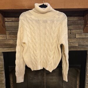 White cable knit sweater